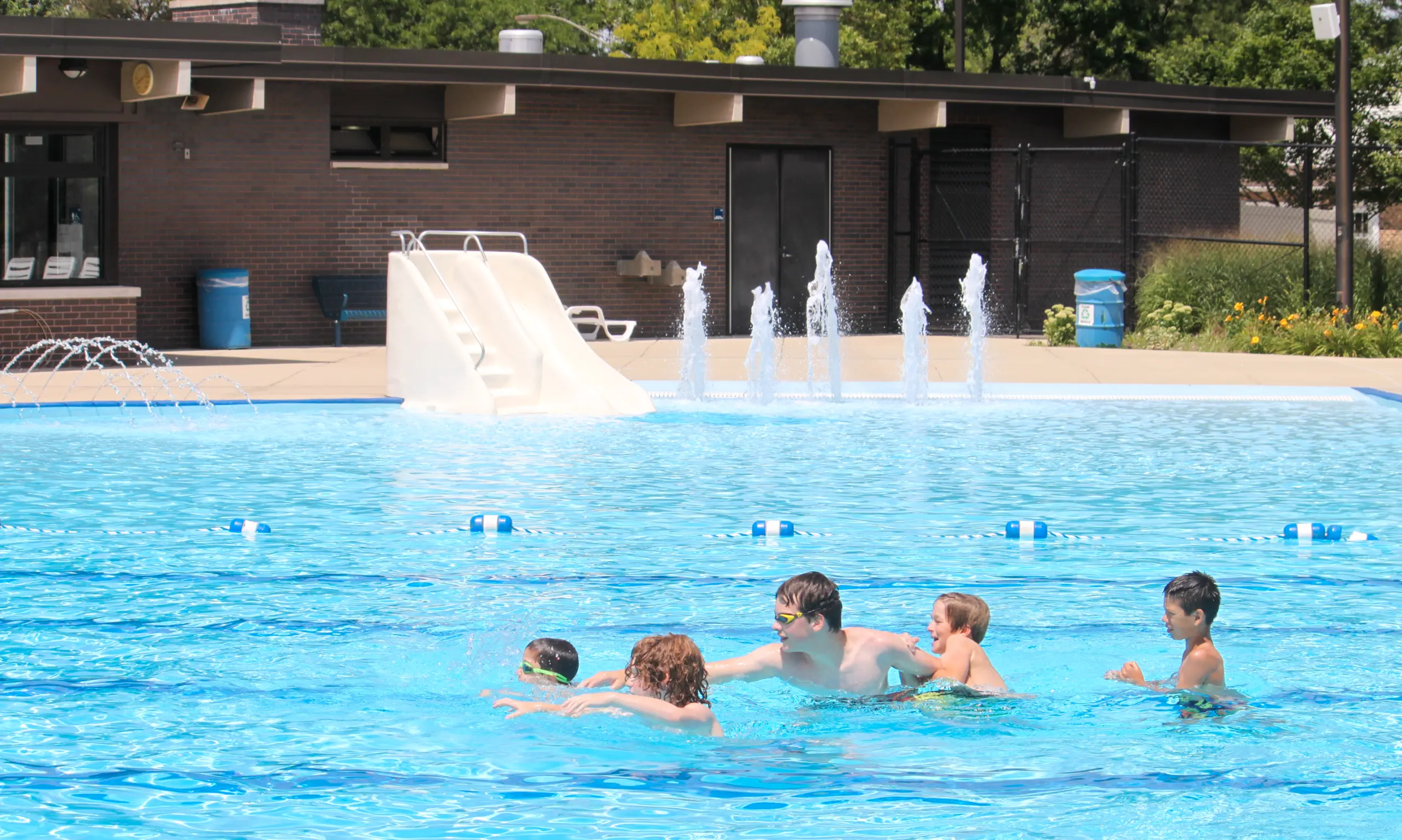 children swimming at camelot pool